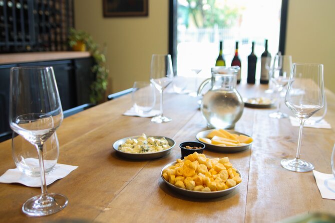 Argentine Wine Tasting in Caminito with Appetizers Included - Weather, cancellation, and planning details