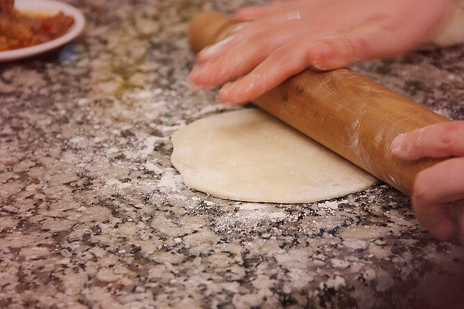 BA: Empanadas and Alfajores Cooking Experience in Palermo - Making dulce de leche alfajores without breaking the cookies