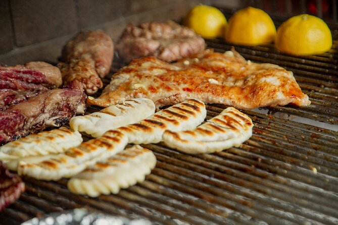 Buenos Aires Asado Experience with Wine Pairing - The rooftop parrilla is the heart of the meal