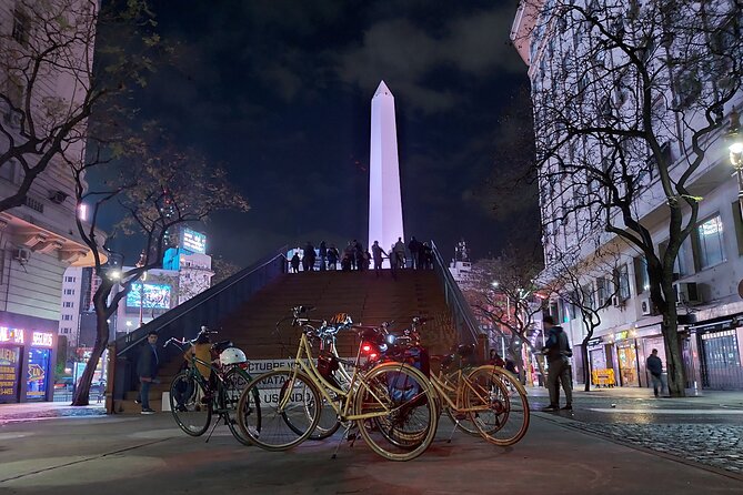 Experience the Lighted Night of Buenos Aires in a Bike - Beginning beneath the lights at Teatro Colón