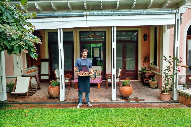 Private Asado Cooking Class in a Beautiful Home with Transfers - Sitting down with the family for a home-cooked meal