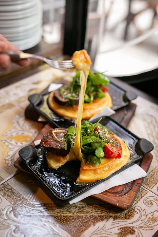 San Telmo: Historical Guided Tour with Street Food & Drinks - Modern bites at a traditional bodegón