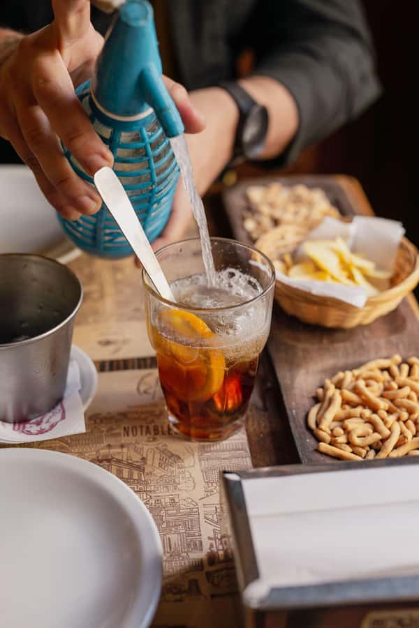 San Telmo: Historical Guided Tour with Street Food & Drinks - Regional Argentine specialties, then dessert