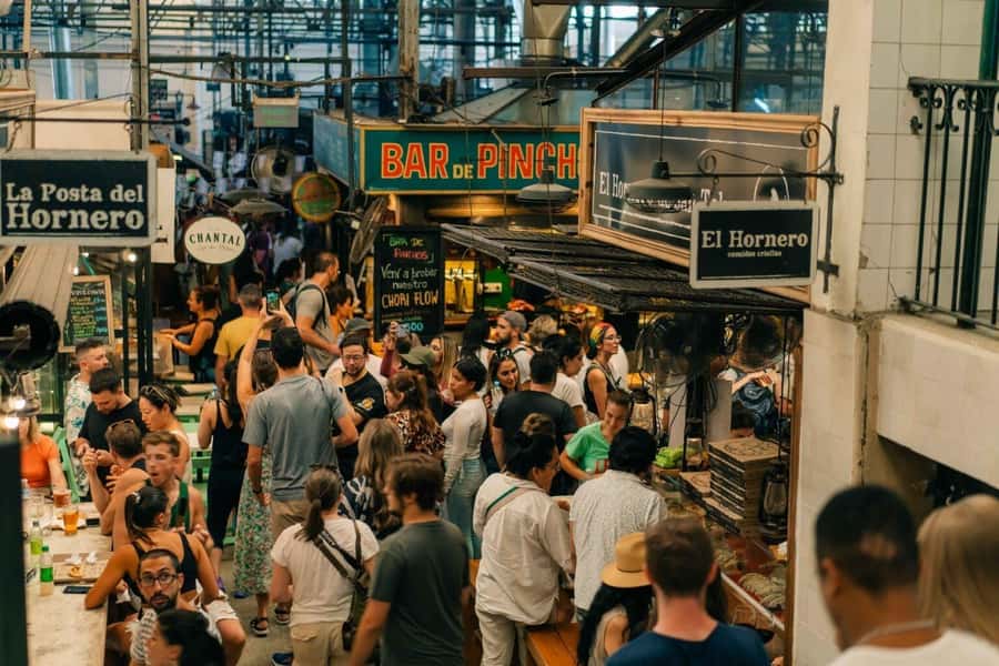 San Telmo: Historical Guided Tour with Street Food & Drinks - Walking through San Telmo Market