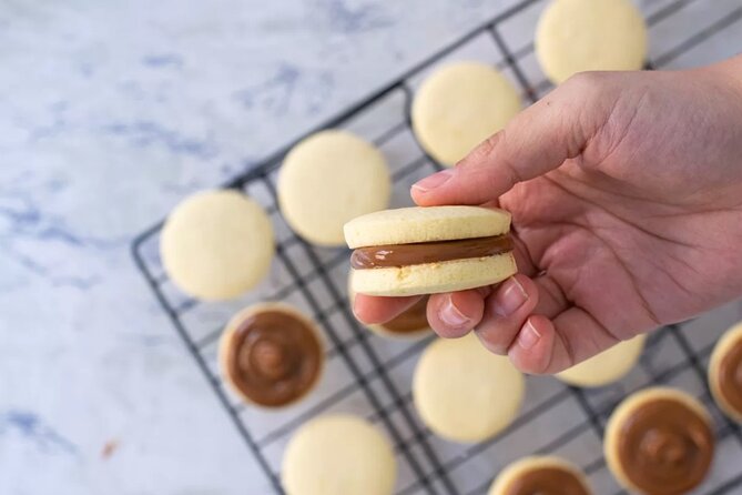 Taste of Tradition: Yerba Mate & Alfajores Experience - Making alfajores with dulce de leche
